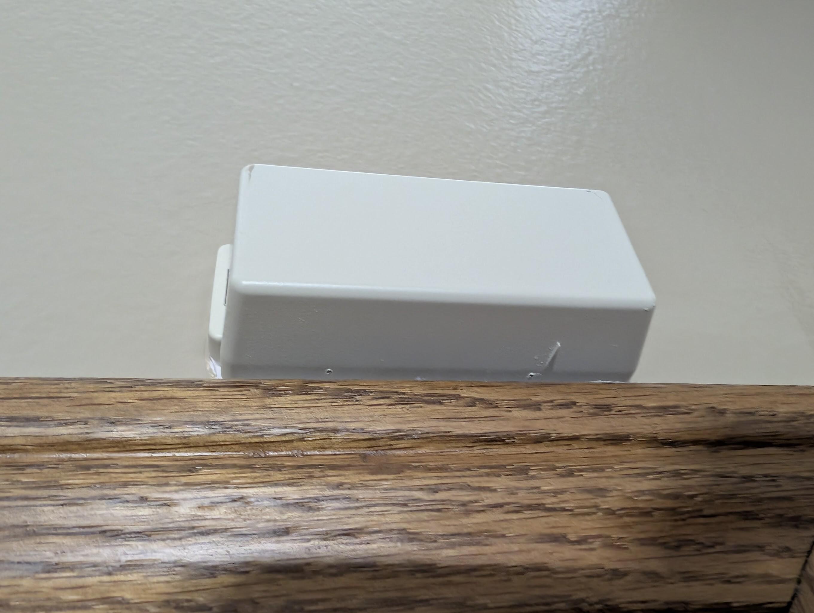 This unobtrusive little box contains a door sensor